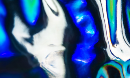 Abstract holographic neon banner background with copy space. Wallpaper with hologram gradient. Liquid imitationの写真素材