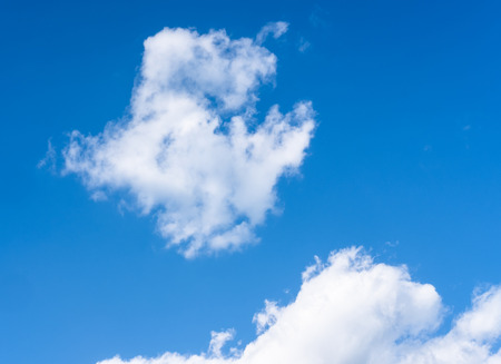 Bright blue sky with white clouds. Great backgroundの写真素材