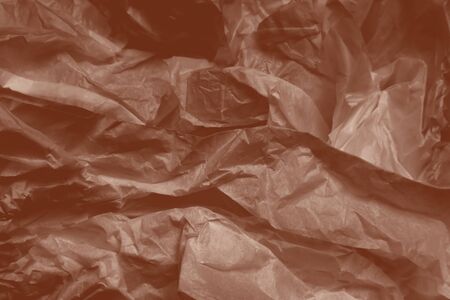 Crumpled, wrinkled paper handmade vintage background top view. Old parchment, packing paper sheet design texture. Abstract, dirty, aged style wallpaper, backdrop. Decorative, distressed designの写真素材
