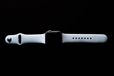 Chekhov, Russia - July 19, 2019: Apple Watch Series 4 white color. A new watch from an Apple company...