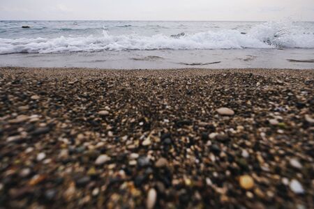 Beautiful ocean sunrise panorama. Scenic seascape. Azure water landscape with blue sky, horizon and white fluffy clouds. Sea turquoise surface. Summer vacation. Wild nature paradise backgroundの写真素材