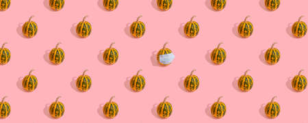 Yellow pumpkin with green stripes.の写真素材