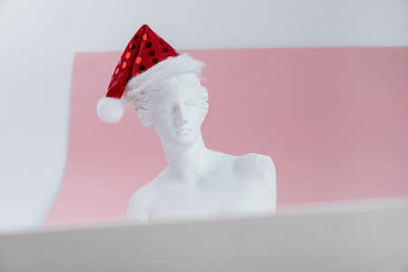 White woman statue on pink backgroundの写真素材