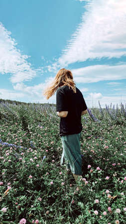 Happy woman rejoices summer