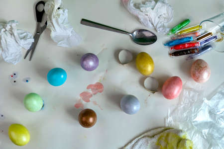 Colored easter eggs on paper gray backgroundの写真素材