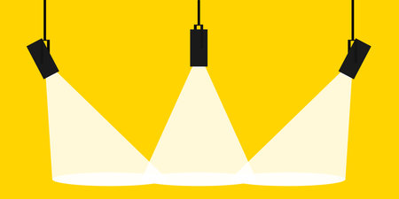 Lamp illumination icon in flat style. Spotlight vector illustration. Movie spotlight. Vector flat spotlight on yellow background with space for text.のイラスト素材