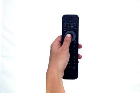 hand holding a remote control