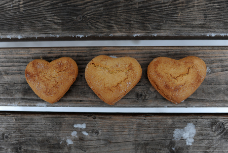 Homemade cookies with cinnamon  over wooden backgroundの写真素材