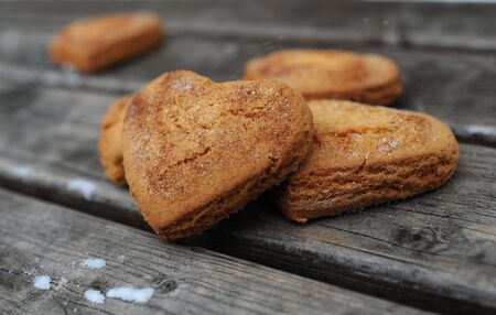 Homemade cookies with cinnamon  over wooden backgroundの写真素材