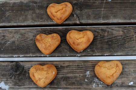 Homemade cookies with cinnamon  over wooden background
