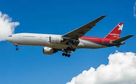 SHEREMETYEVO, MOSCOW REGION, RUSSIA - June 28, 2017: Boeing 777-200 of Nordwind Airlines makes a landing at Sheremetyevo International Airport.のeditorial素材