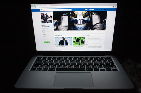MOSCOW, RUSSIA - July, 09, 2017 Official page in the Facebook social network of Formula 1 pilot Lewis Hemilton on the laptop screenのeditorial素材