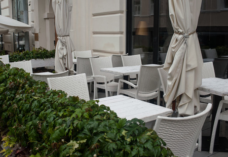Tables of a street cafe after a rain