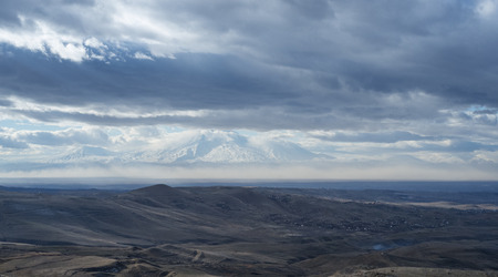 Mountain landscape and sky covered with clouds, in Armenia.の写真素材