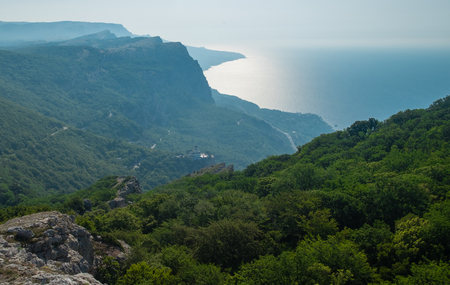 Mountain landscape. View of the sea and the green mountains in the Crimea.のeditorial素材