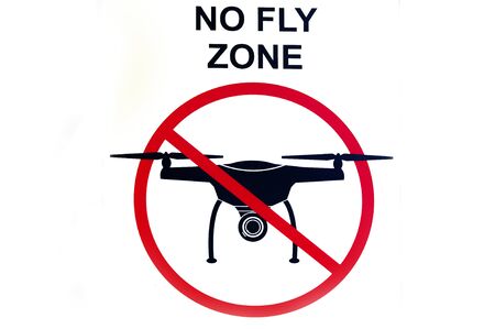 Signboard NO FLY ZONE  with a picture of a dithered droning.の写真素材