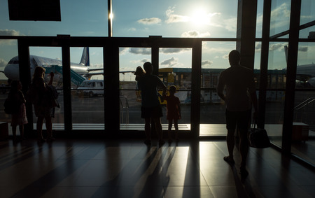 SIMFEROPOL, RUSSIA, JULY 28, 2017 Silhouettes of passengers at the International Airport of Simferopolのeditorial素材