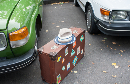 White hat on a brown suitcase.の写真素材