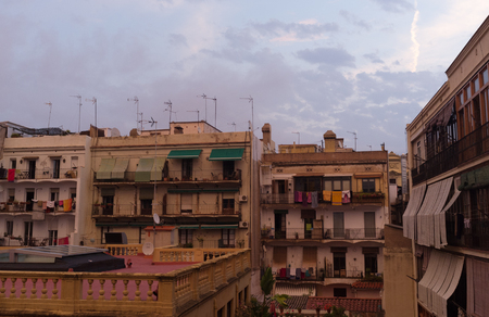 Drying laundry on the balconies of an apartment building in Barcelona.の写真素材