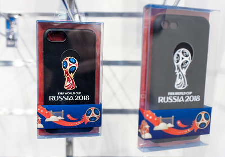 14 December 2017 Moscow, Russia, Symbols of the 2018 FIFA World Cup on mobile phone cases in the official store.のeditorial素材