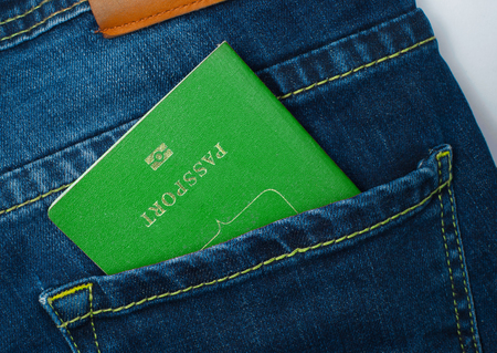 Green passport in the back pocket of the jeans.の写真素材