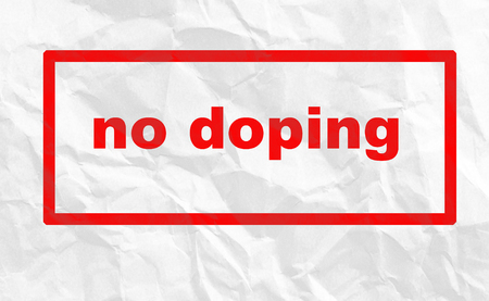 Caption No Doping on a crumpled sheet of white paperの写真素材