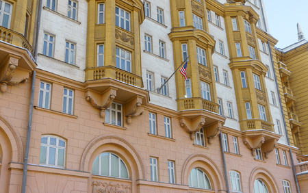 The US national flag on the building of the Embassy of the United States of America in Moscow.の写真素材
