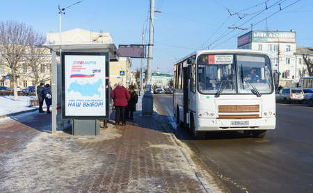 February 7, 2018. Orel, Russia A poster with information on the election of the President of the Russian Federation at a bus stop in Orel.のeditorial素材