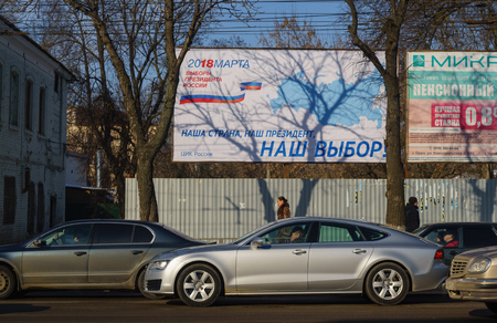 February 7, 2018. Orel, Russia A poster with information about the election of the President of the Russian Federation on a street in Orel.のeditorial素材