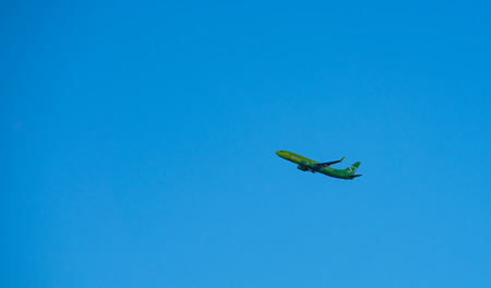8 JULY 2018 Russia, Moscow. The aircraft S7 Airlines is landing at the Domodedovo airport.