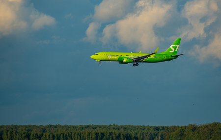 8 JULY 2018 Russia, Moscow. The aircraft Boeing 737-800 S7 Airlines is landing at the Domodedovo airport.のeditorial素材
