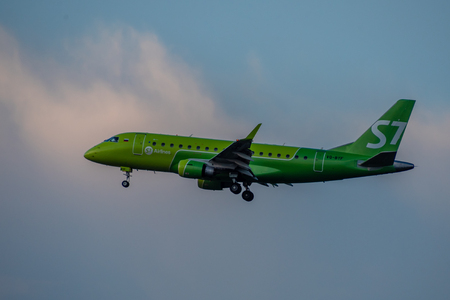 8 JULY 2018 Russia, Moscow. The aircraft  Embraer ERJ-170 S7 Airlines is landing at the Domodedovo airport.のeditorial素材