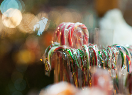 Christmas candy canes on the shop counterの写真素材