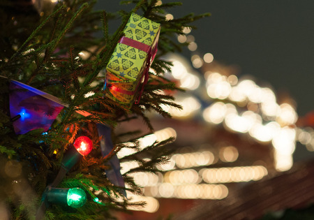 Colorful toys on the green Christmas tree.の写真素材