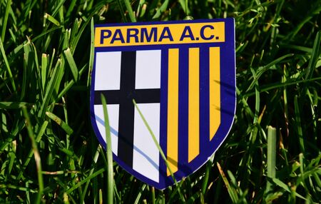 September 6, 2019 Istanbul, Turkey. The emblem of the Italian football club Parma on the green grass of the football field.のeditorial素材