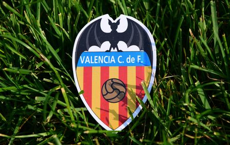 September 6, 2019 Istanbul, Turkey. The emblem of the Spanish football club Valencia on the green grass of the football field.のeditorial素材
