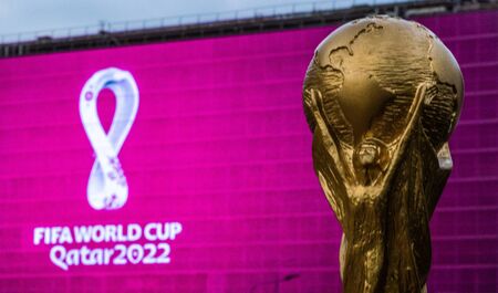 4 September 2019, Moscow, Russia. Copy of world cup trophy on background logo of the FIFA world Cup...