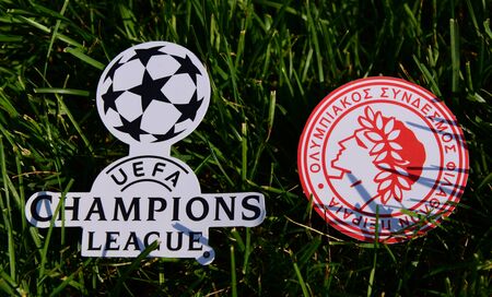 September 6, 2019 Istanbul, Turkey. The emblem of the Greek football club Olympiacos Piraeus next to...