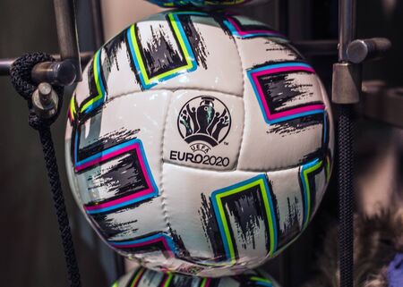 10 November 2019 London, United Kingdom. The official ball of the European football Championship 2020 Adidas Uniforia Competition in the sports shop window.のeditorial素材