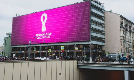 4 September 2019, Moscow, Russia. The logo of the FIFA world Cup 2022, which will be held in Qatar, on a giant screen in the city center.のeditorial素材