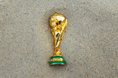 May 30, 2019. Doha, Qatar. FIFA World Cup trophy on sand. FIFA World Cup  2022  will be held in Qatar.のeditorial素材