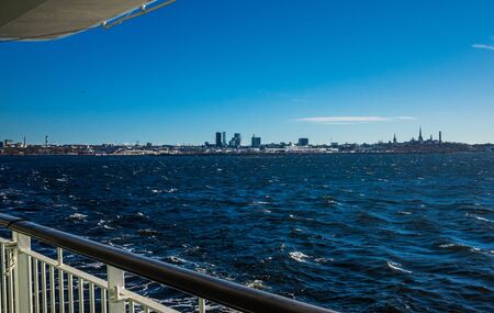 April 21, 2018. Tallinn, Estonia. View of the historic center of Tallinn from the side of a passenger ferry in clear weather.のeditorial素材