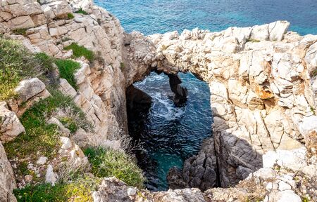 The rocky coast of the Mediterranean Sea on the Akamas Peninsula in the northwest of the island of Cyprus.の写真素材
