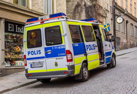 April 22, 2018, Stockholm, Sweden. A police car on a street in the Old Town in Stockholm.のeditorial素材