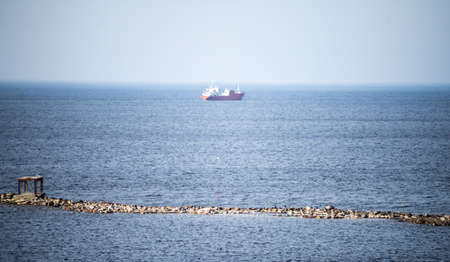 Fishing trawler in the blue sea in the Gulf of Tallinn