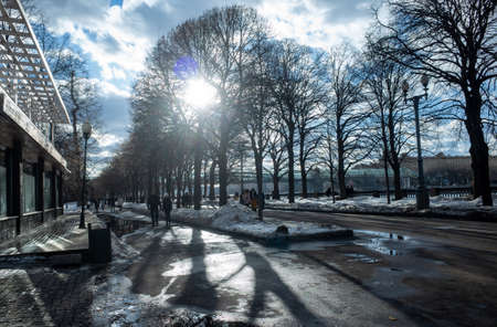 February 17, 2019, Moscow, Russia. Passers-by on Pushkinskaya embankment in Gorky park in Moscow.のeditorial素材