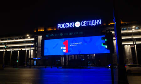 December 10, 2018, Moscow, Russia. A huge media screen on the facade of the international news agencyのeditorial素材