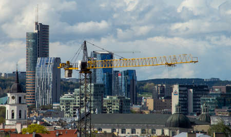 April 27, 2018 Vilnius, Lithuania, Construction crane on the background of skyscrapers in Vilnius.のeditorial素材
