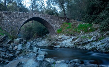 Ancient stone Venetian bridge in the Troodos mountains on the island of Cyprus.