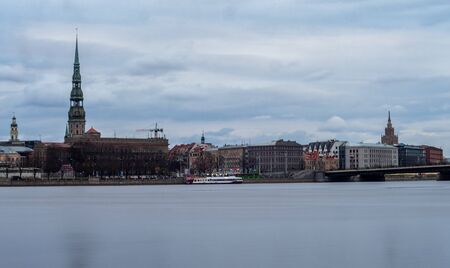View of the Old Town in Riga from the opposite bank of the Daugava River.の写真素材